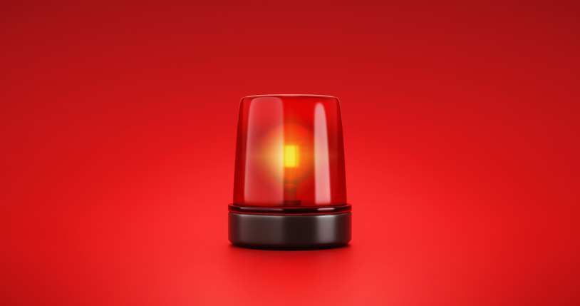 lampa-ostrzegawcza-znak-alarmu-na-czerwonym-tle.jpg